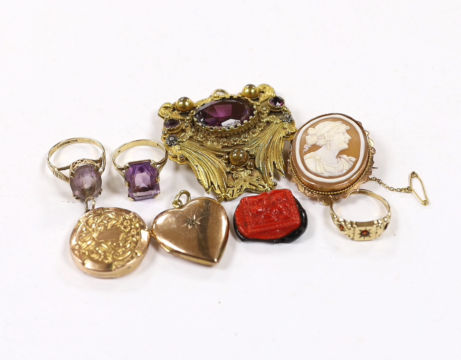 Three assorted 9ct gold and gem set rings including 1960's amethyst, a 9ct and oval cameo shell set brooch, a George V 9ct gold circular locket and three other items including diamond chip set heart shaped locket.